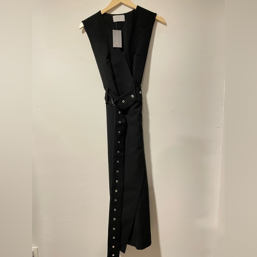Black cocktail dress with silver grommet belt